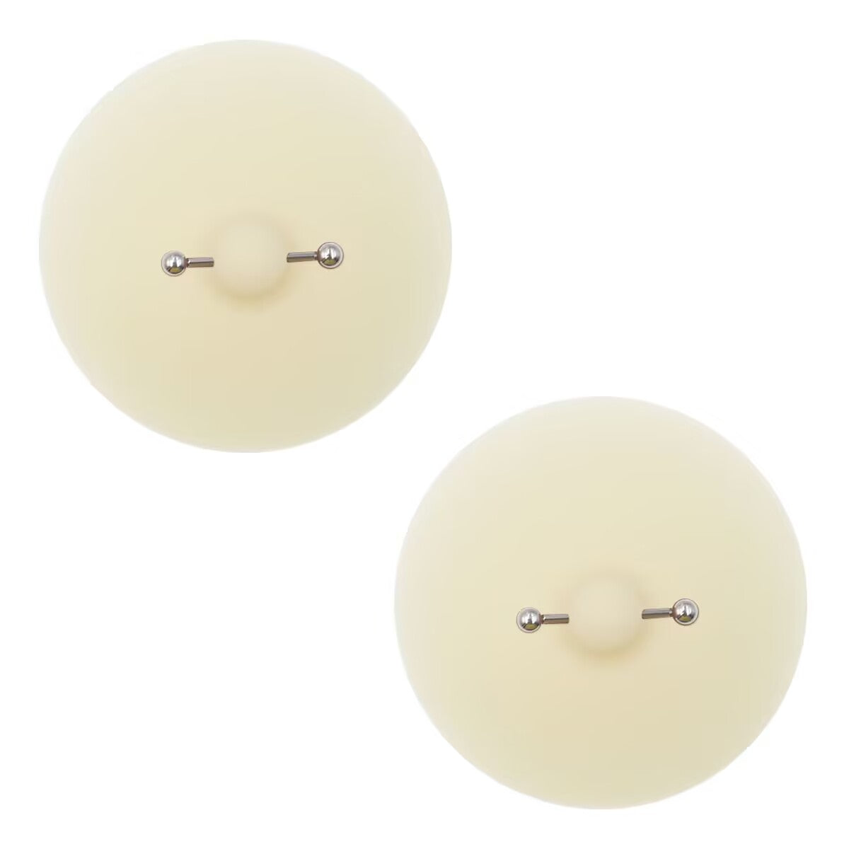 Pair of cream tone fake nipple piercing silicone pasties with metallic barbell accents.