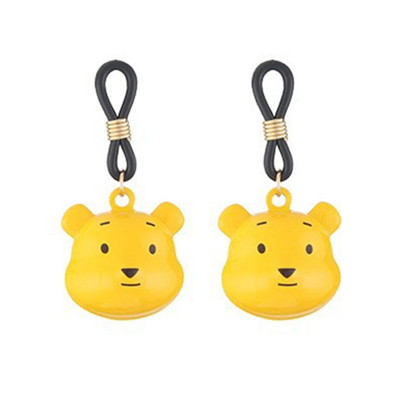 A pair of yellow cartoon bear nipple loops featuring adjustable black bands with gold sliding beads for intensity control.