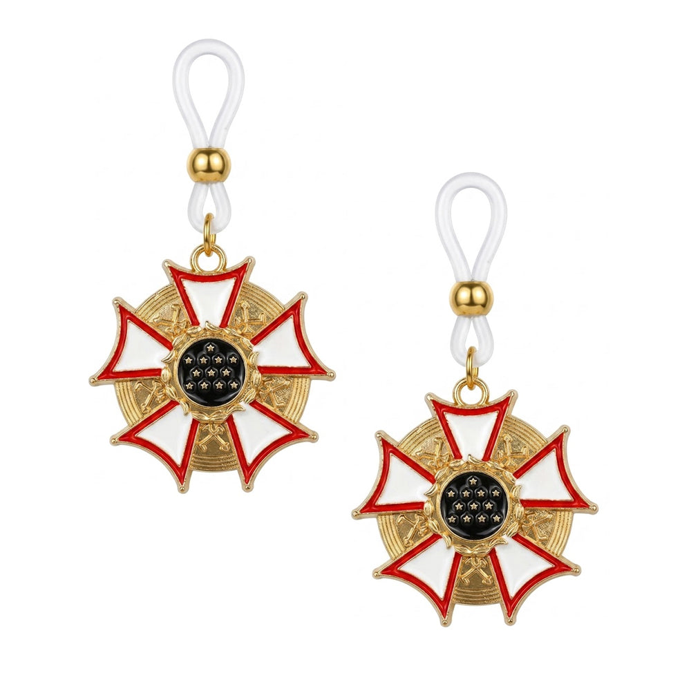 A pair of fake nipple rings with military style medal charms and adjustable gold slide beads for alternative fashion styling.