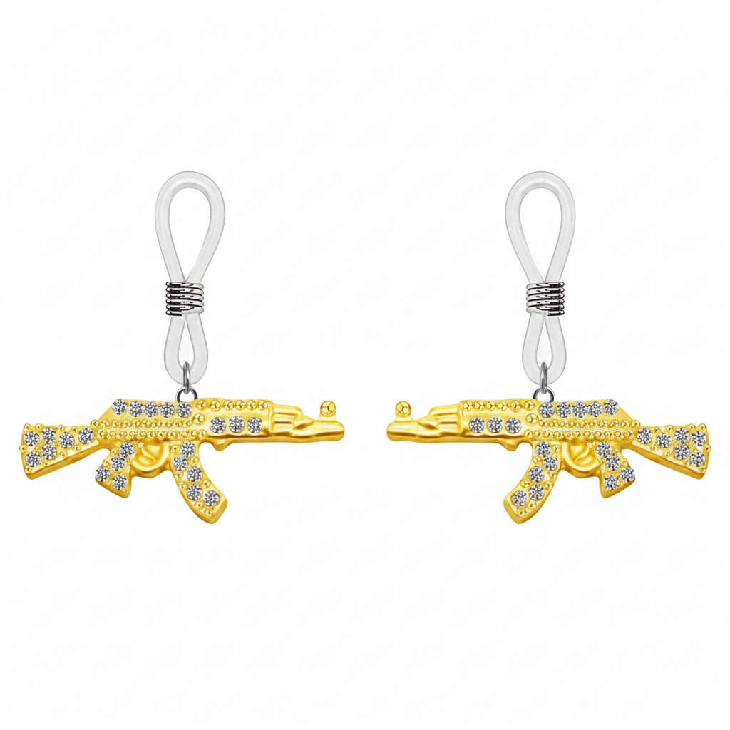A pair of gold AK47 rifle non-piercing nipple rings with crystals and clear silicone loops shown together.