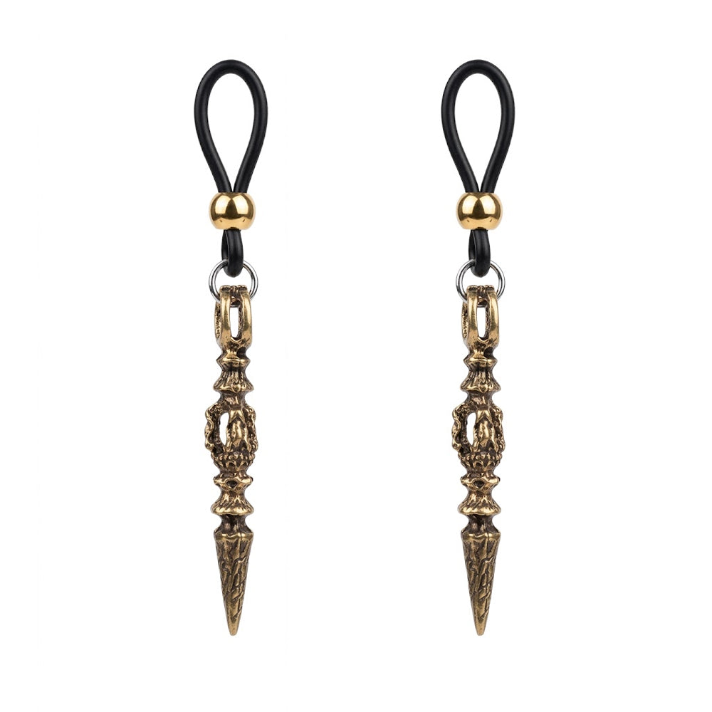 A complete pair of alternative punk style non-piercing nipple rings with matching detailed antique bronze Phurba Vajra charms and adjustable black rubber loops, on a white background.