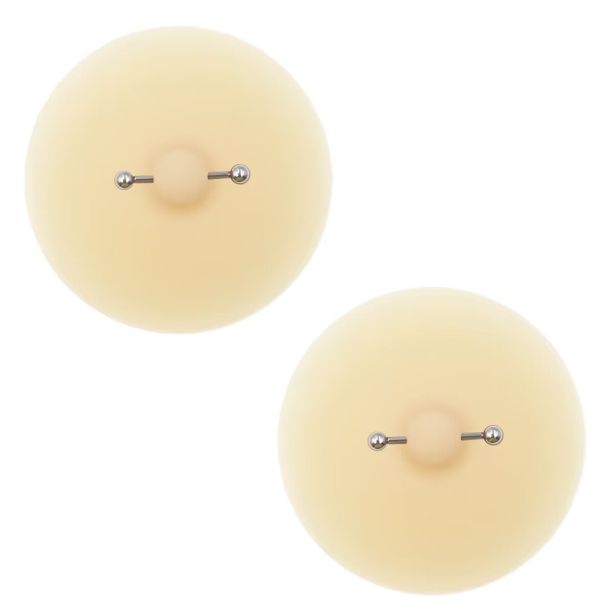Pair of light tan non-pierced nipple jewelry silicone pasties for body decoration.