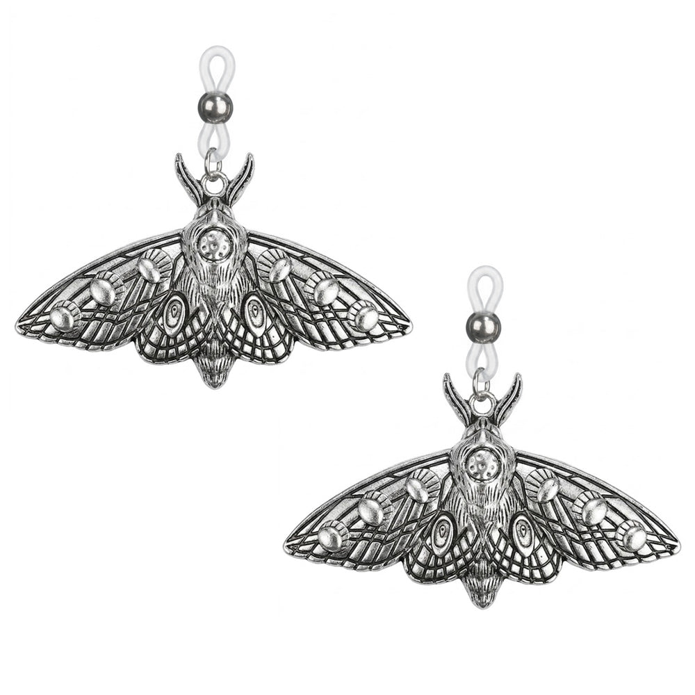 A pair of vintage moth-shaped fake nipple rings for alternative and grunge fashion styling.