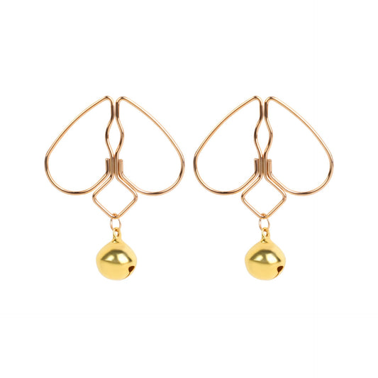 A pair of adjustable gold heart-shaped sensory body clamps with decorative bells on white background.