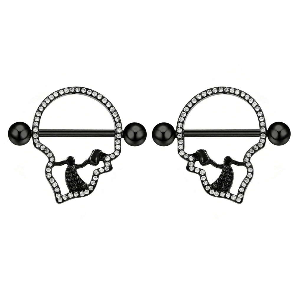 A matched pair of gothic-style black skull nipple shields with crystal accents.