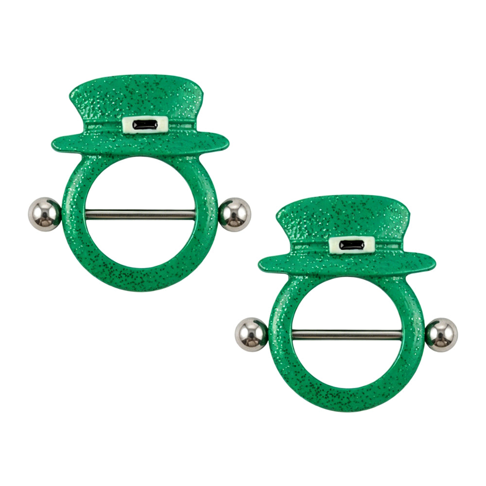 A matching pair of green glittery leprechaun hat nipple shields with silver F136 titanium straight barbells, showcased on a clean white background.