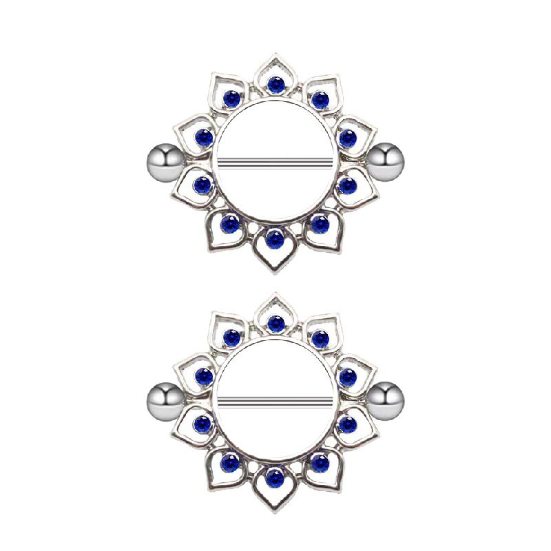 A pair of silver mandala flower nipple piercing rings with royal blue crystal petals.