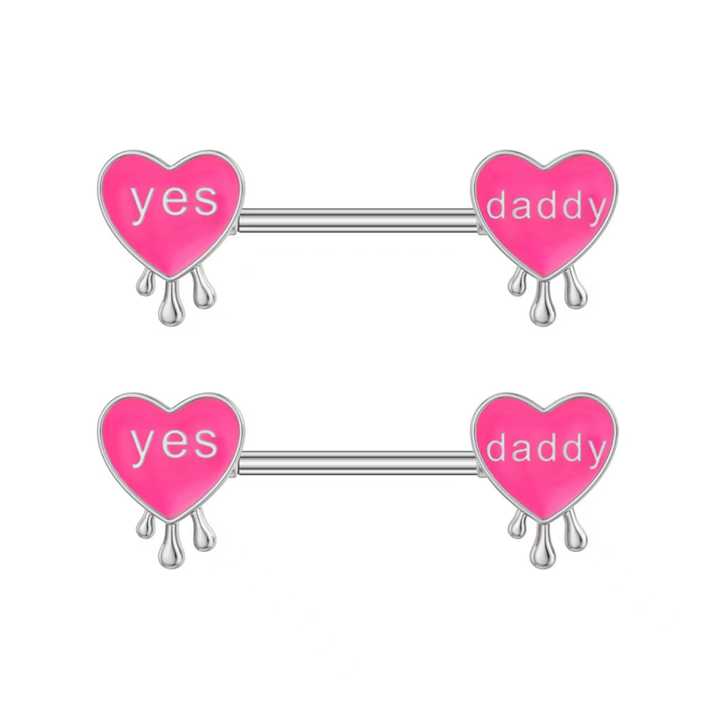 A pair of matching pink heart drip nipple shields for Y2K style body jewelry.