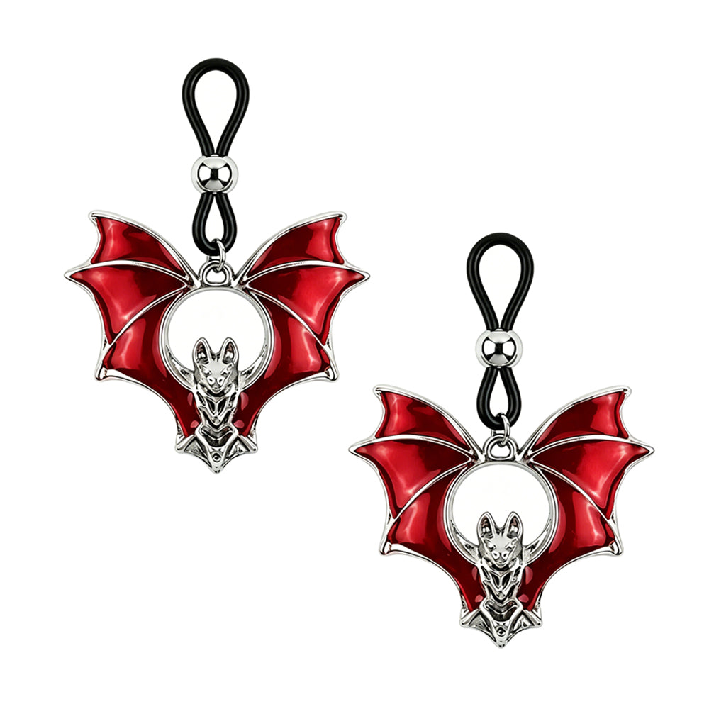 A pair of red and silver gothic vampire bat non-piercing nipple clamps with adjustable rubber loops, sold as a set, isolated on a clean white background.