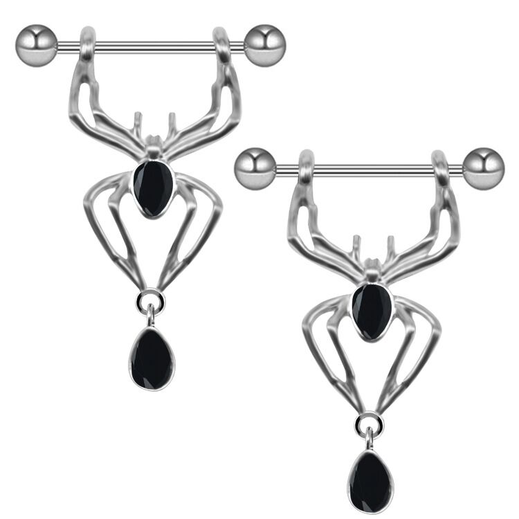 A pair of matching silver spider nipple shield barbells with black gem accents.