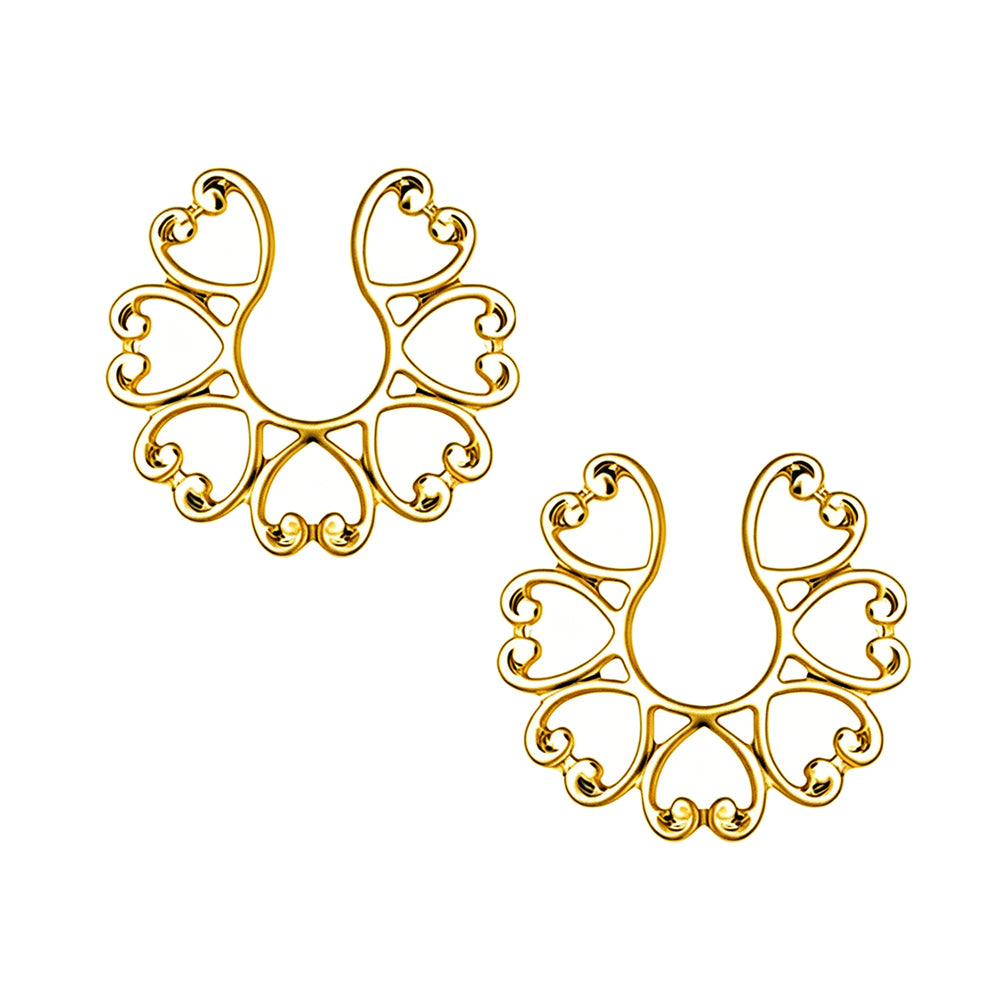 A pair of gold Y2K style fake nipple rings with non-pierced clip-on design, perfect for coquette outfits.