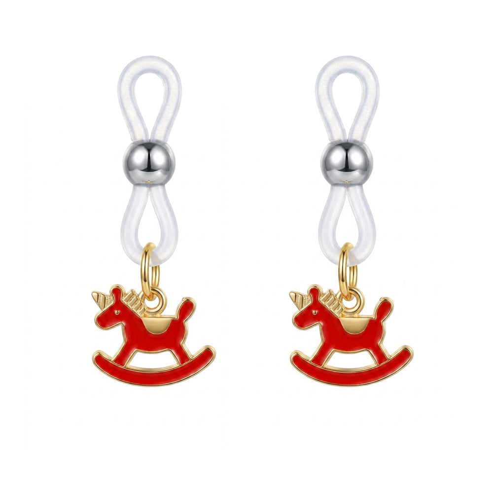 A pair of adjustable non-piercing nipple clamps featuring red enamel rocking horse charms with gold-tone accents.
