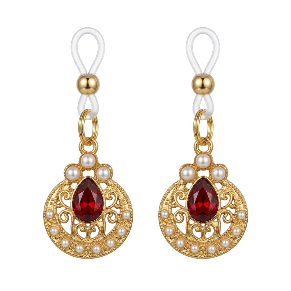 A pair of ornate ruby and pearl non-piercing nipple rings with adjustable silicone loops.