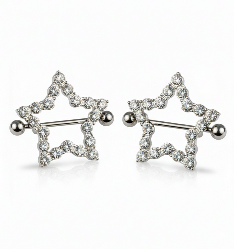 A pair of silver-toned star nipple rings featuring a five-pointed shield encrusted with shimmering crystals.