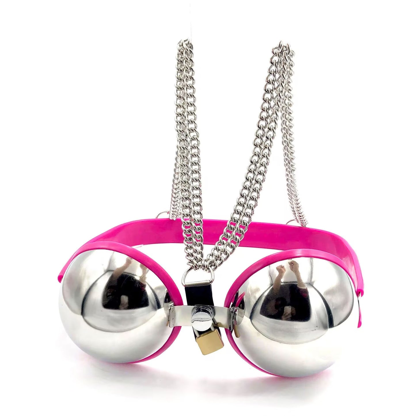 Alternative fashion festival top featuring a smooth metal lockable bra with vibrant pink trim, padlock, and heavy chain harness.