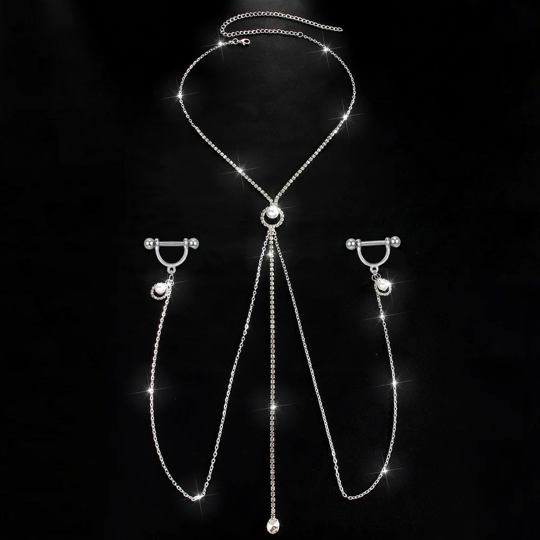 A complete single set of one-piece nipple ring body chain jewelry against a black background, featuring a rhinestone necklace with a central pearl charm connected to dual side chains and straight barbells.