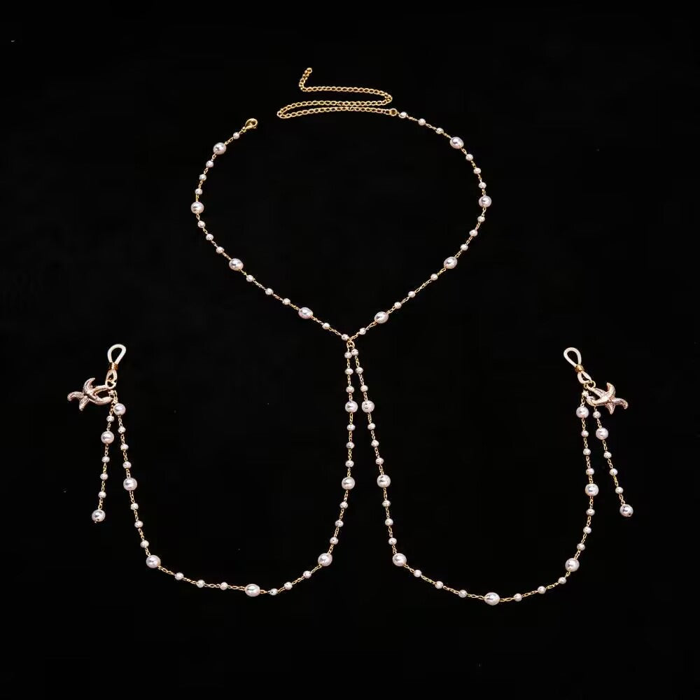 Full view layout of Y-shaped pearl starfish nipple clamp body harness chain for women