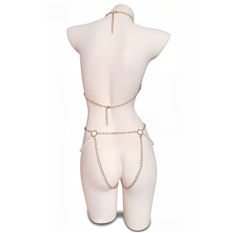 Back view of gold body chain harness showing adjustable back closure and waist chain drape on a mannequin.