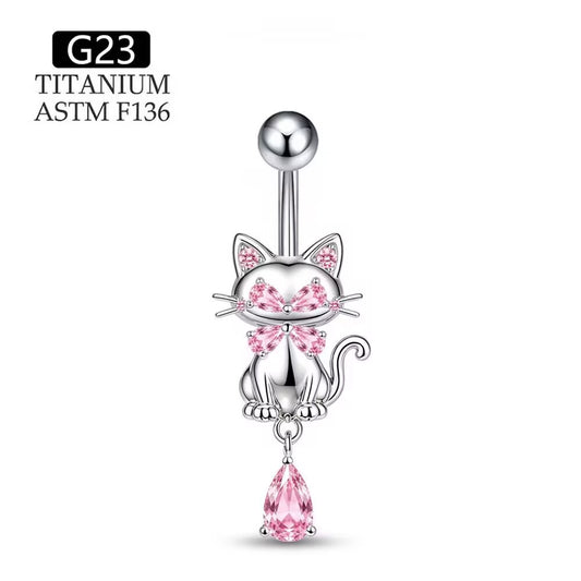 Cute pink crystal cat belly button ring dangle on a plain white background, showing the kitten design and dangling zircon gem.