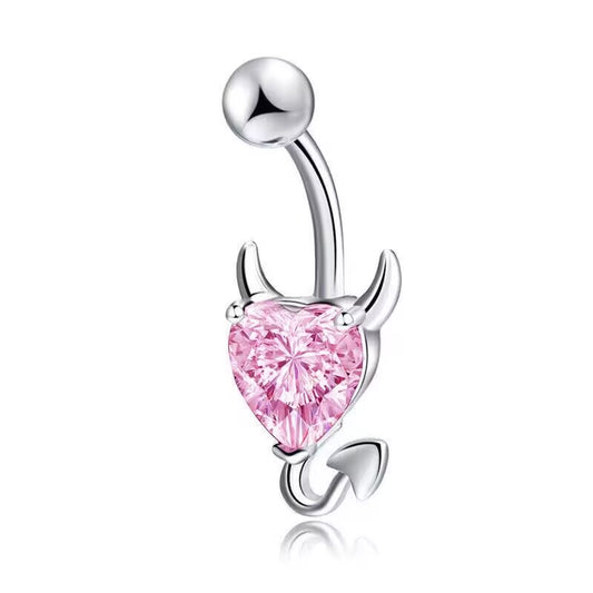 A cute coquette aesthetic pastel pink cz gemstone devil heart navel piercing ring with devil tail.