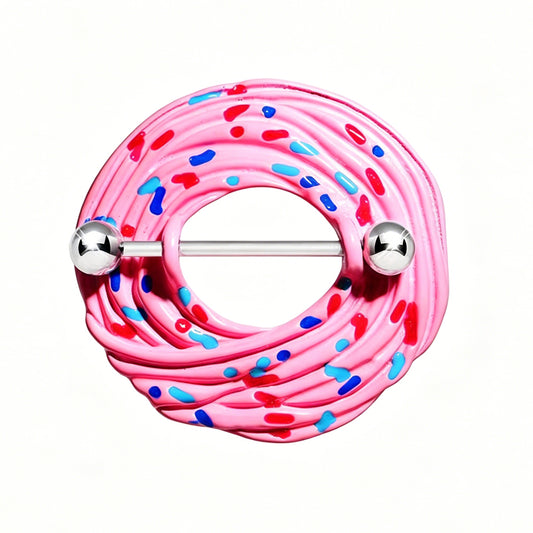 Close-up shot of a single pink frosted donut nipple shield ring with blue and red sprinkles on a 14G straight metallic barbell with silver ball ends, isolated on a pure white background.