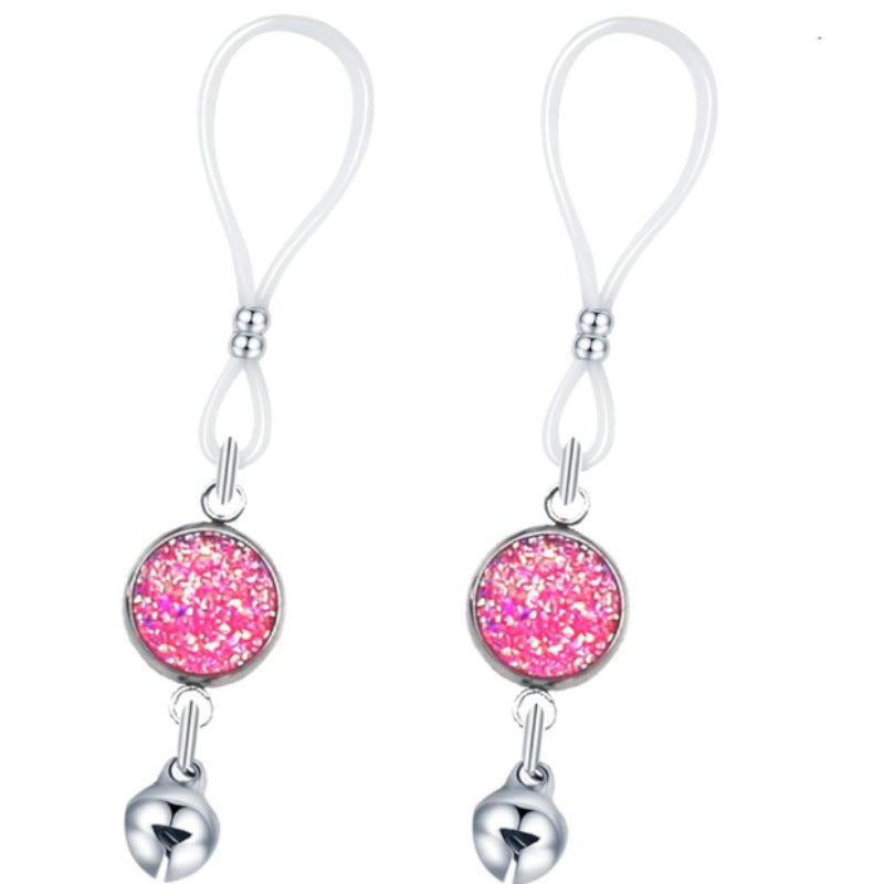Matching pair of pink glitter-look round nipple jewelry with loop attachments and silver-tone bell charms