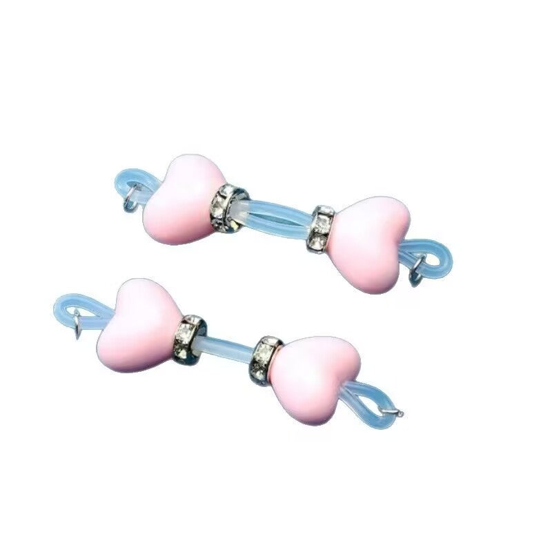 Pair of pink heart fake nipple rings with sky blue silicone loops and sparkling rhinestone beads, non-piercing body jewelry set.
