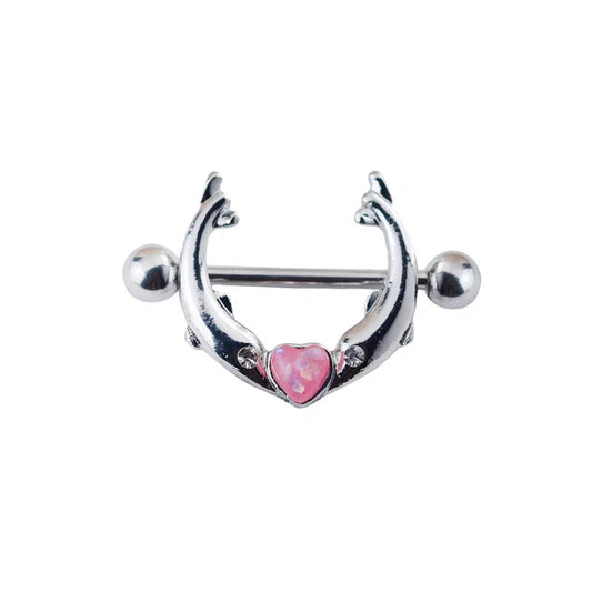 Front view of a dolphin nipple shield with a pink heart opal on a clean white background.