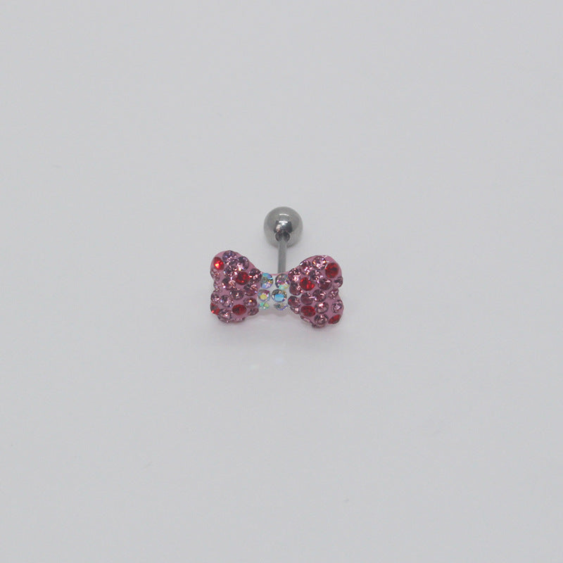One pink rhinestone bow earring with red accents, an iridescent center and silver-tone ball end.