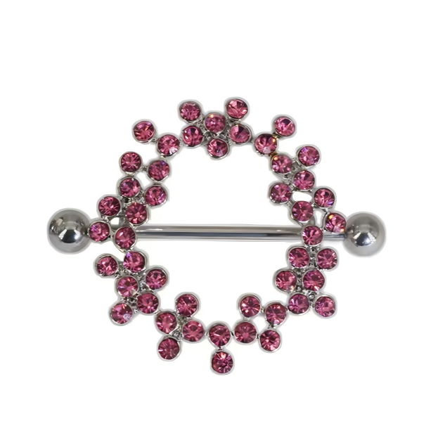 A single crystal nipple shield piercing with hot pink rhinestones in a fixed wreath design on a pure white background.