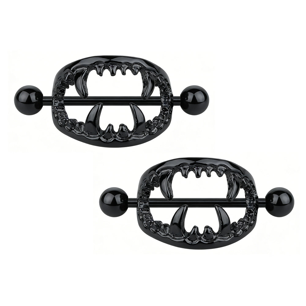 Two black punk style fangs nipple shields on pure white background.