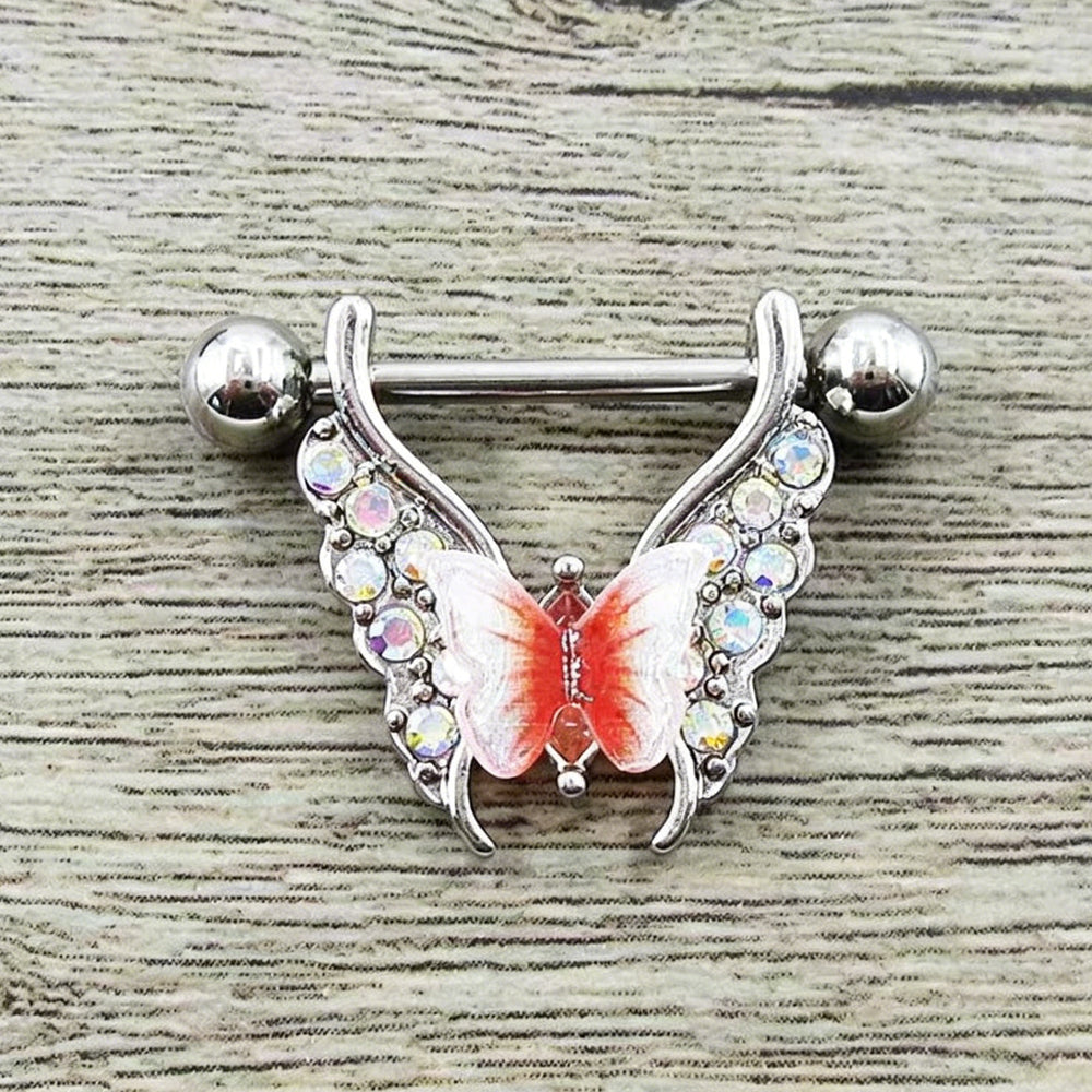 Close-up real shot of a 3D gradient butterfly nipple shield jewelry on a rustic wooden background