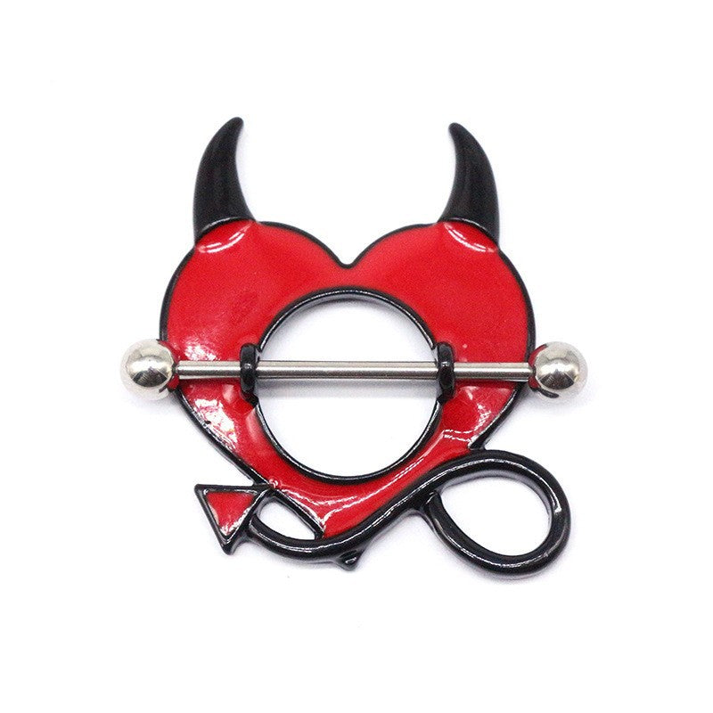 A pair of red devil heart nipple shield rings with black horns and tail.