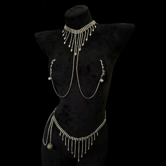 Full body jewelry set featuring a rhinestoned fringe choker necklace with connected nipple clamps and a matching tassel waist chain belt on a black mannequin.