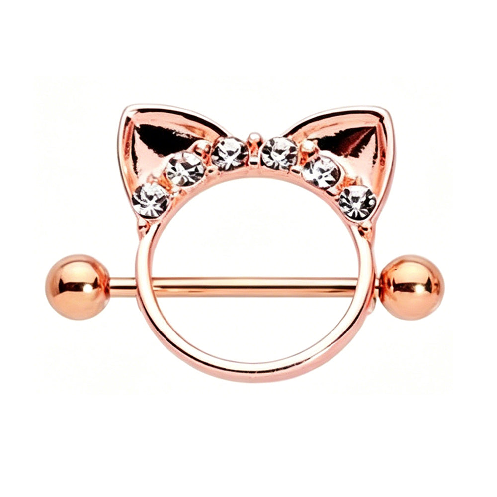 Front view of a 14G rose gold cat ear nipple ring shield with clear crystal accents on a pure white background