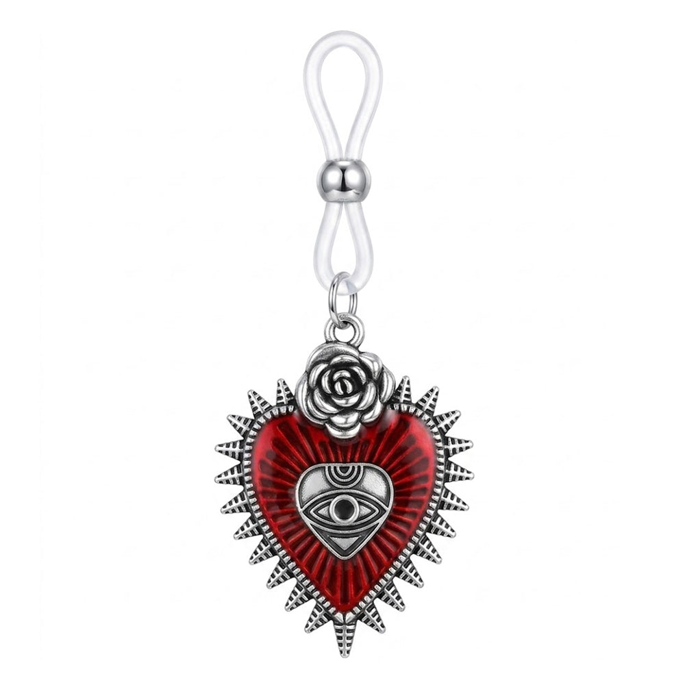Close-up of a gothic red sacred heart pendant featuring a silver rose and an all-seeing eye design on an adjustable clear loop.