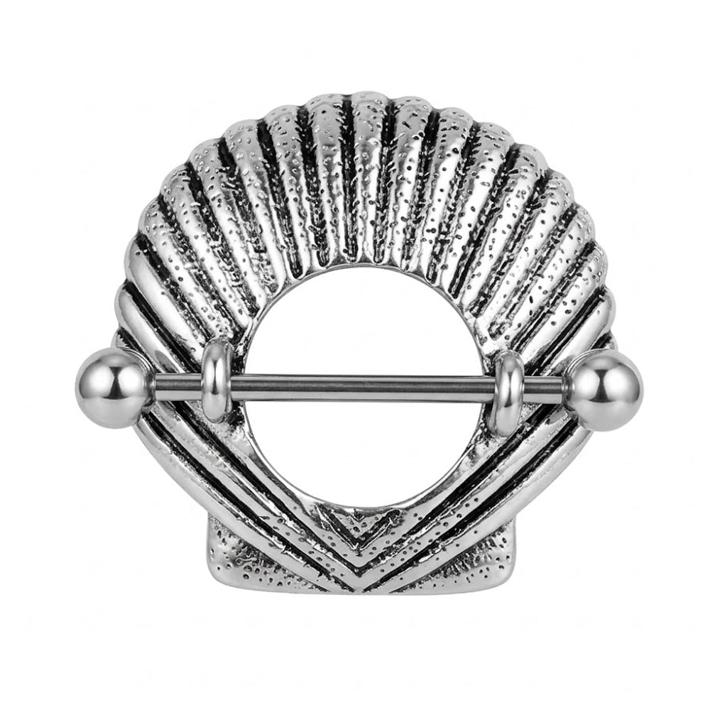 Front view of a vintage silver scallop shell nipple shield jewelry with textured details.