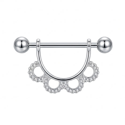 Front view of a decorative nipple shield featuring a delicate scalloped lace design with shimmering crystal accents on a clean white background.
