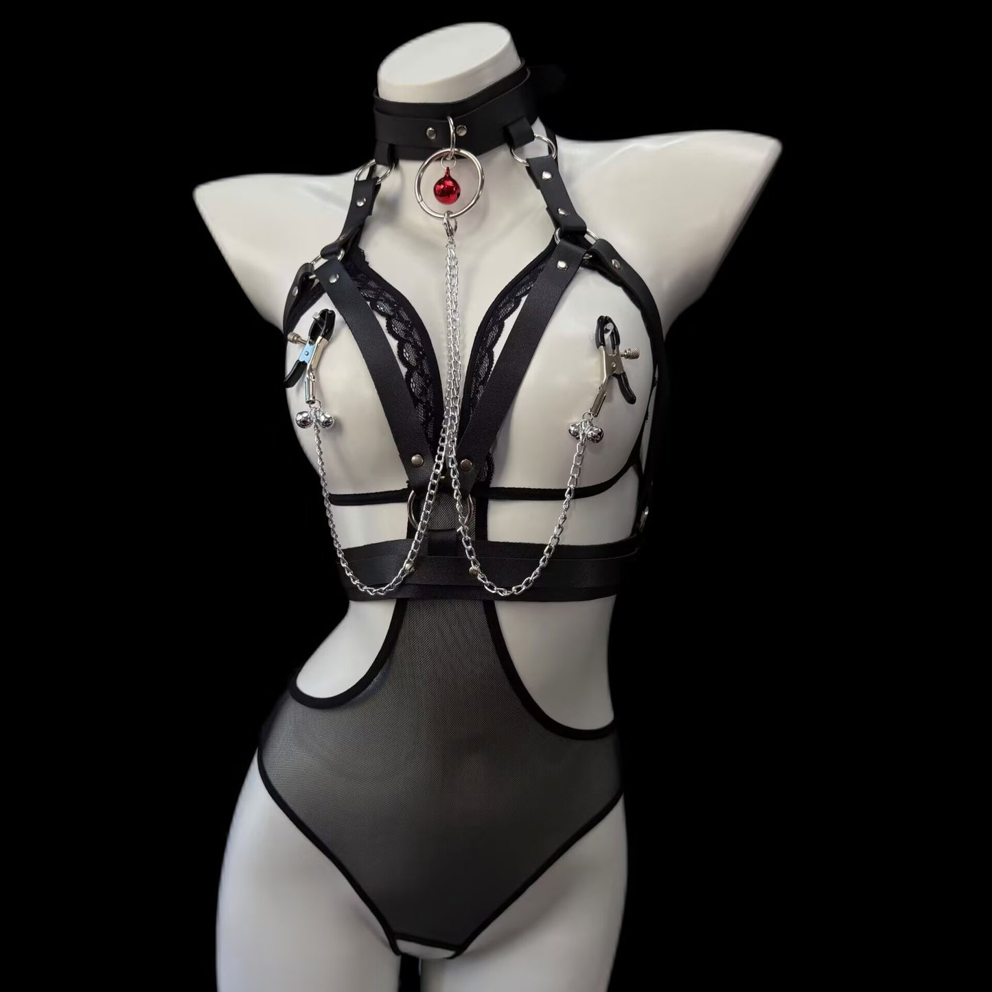Adjustable leather harness featuring screw-tightened non-pierced nipple clamps with hanging bells