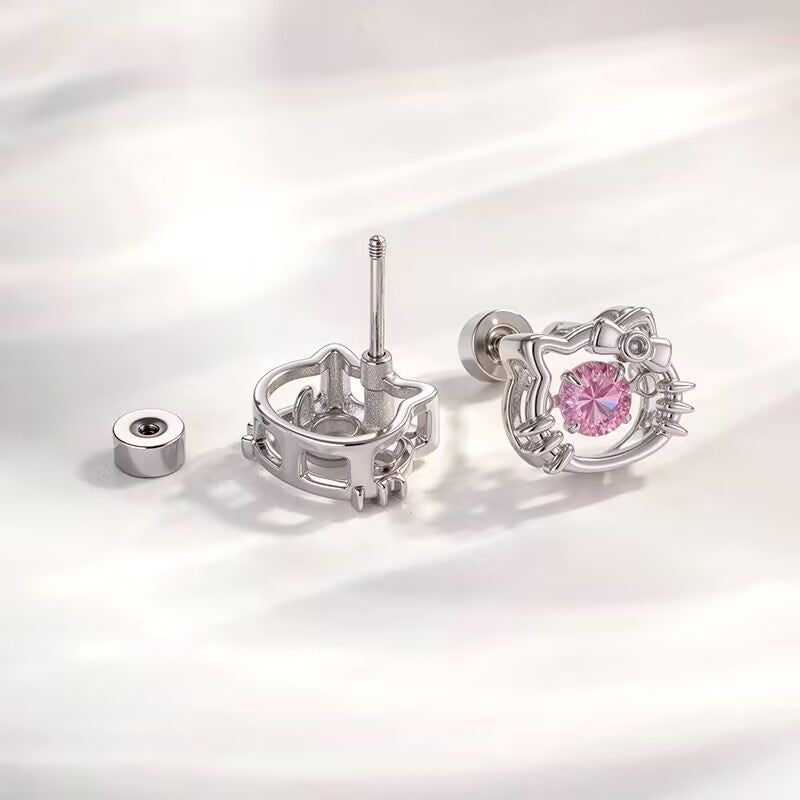 Detailed view of thread screw flat back disc attachment and pink cat stud earring structure