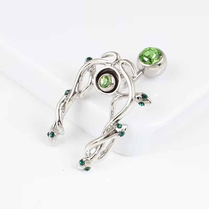 Side angle view highlighting the 3D double snake jacket frame design and emerald cubic zirconia stone details.