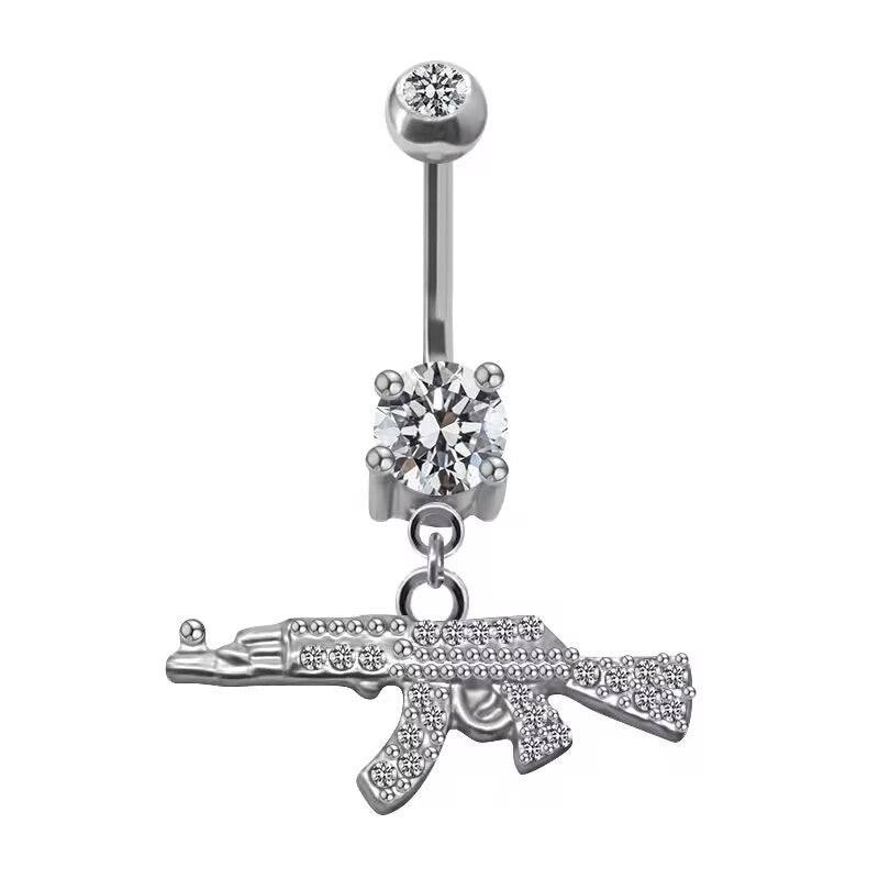 Premium silver belly curved bar with a large 4-prong claw clear cubic zirconia and dangling iced-out AK47 rifle.