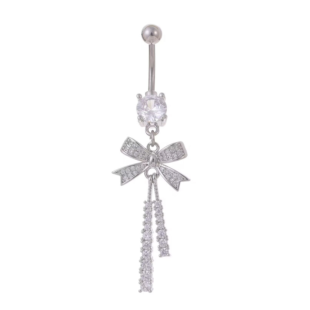 Front view of a silver-tone bowknot navel piercing jewelry featuring cascading crystal tassels on a clean white background.