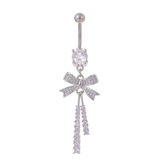 Front view of a silver-tone bowknot navel piercing jewelry featuring cascading crystal tassels on a clean white background.