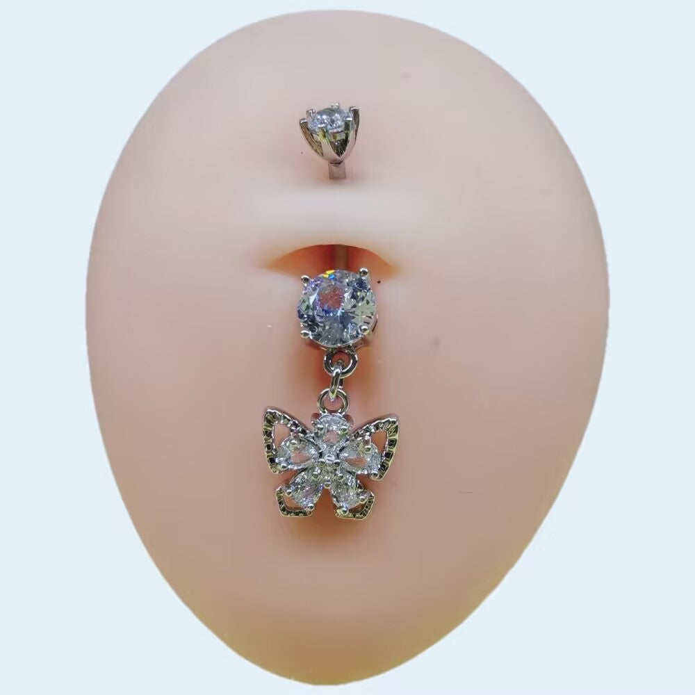 Sleek silver metallic butterfly dangling navel piercing jewelry with sparkling zircon stones on a realistic belly model