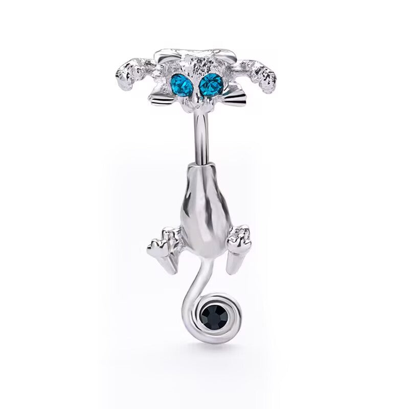 Front view of a polished silver cat belly button ring with blue crystal eyes and a black stone on the tail.