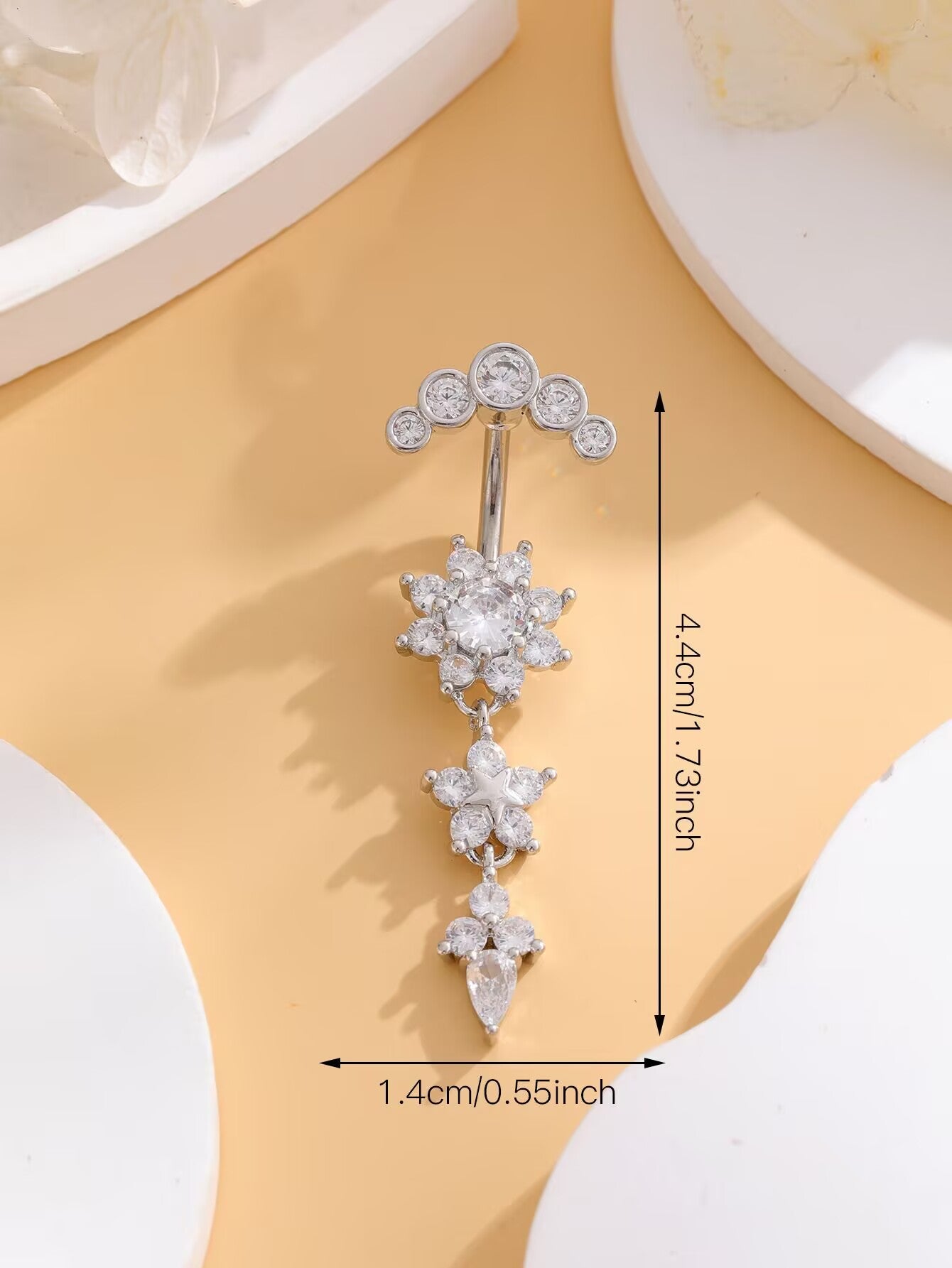 Silver flower dangle belly button ring length and width dimension chart showing 4.4 cm height and 1.4 cm width.