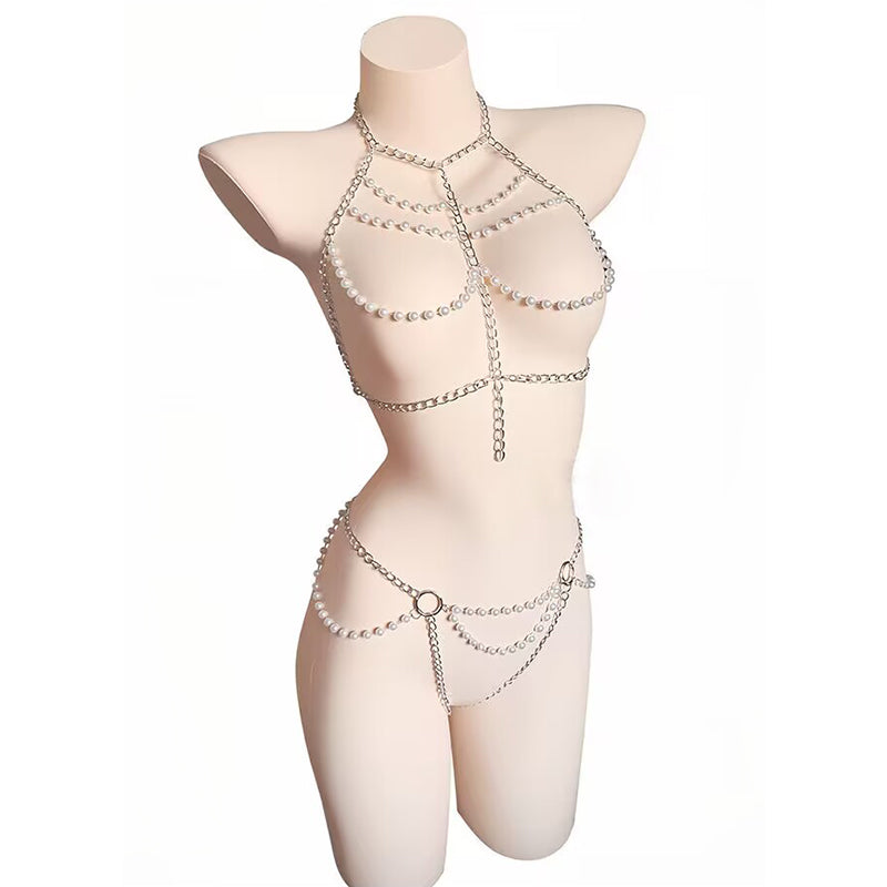 Three-quarter side view of a silver pearl bra chain and waist harness jewelry set on a display mannequin.