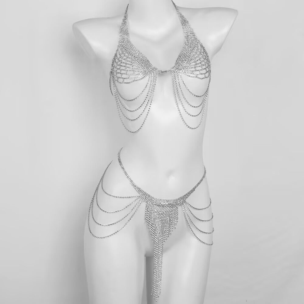 Silver rhinestone body chain set featuring a halter crystal bra and matching tassel waist chain displayed on a mannequin.