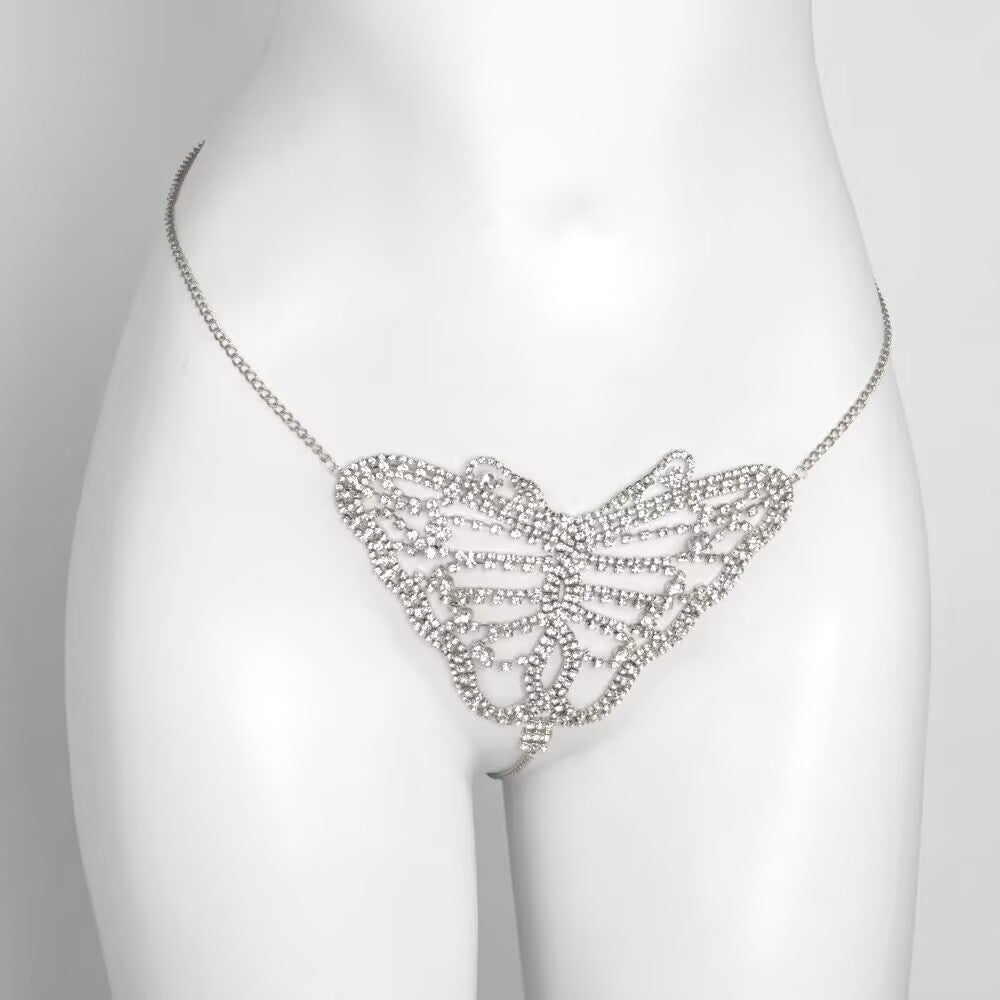 Silver crystal hollow butterfly panty body chain displayed on mannequin with white background.